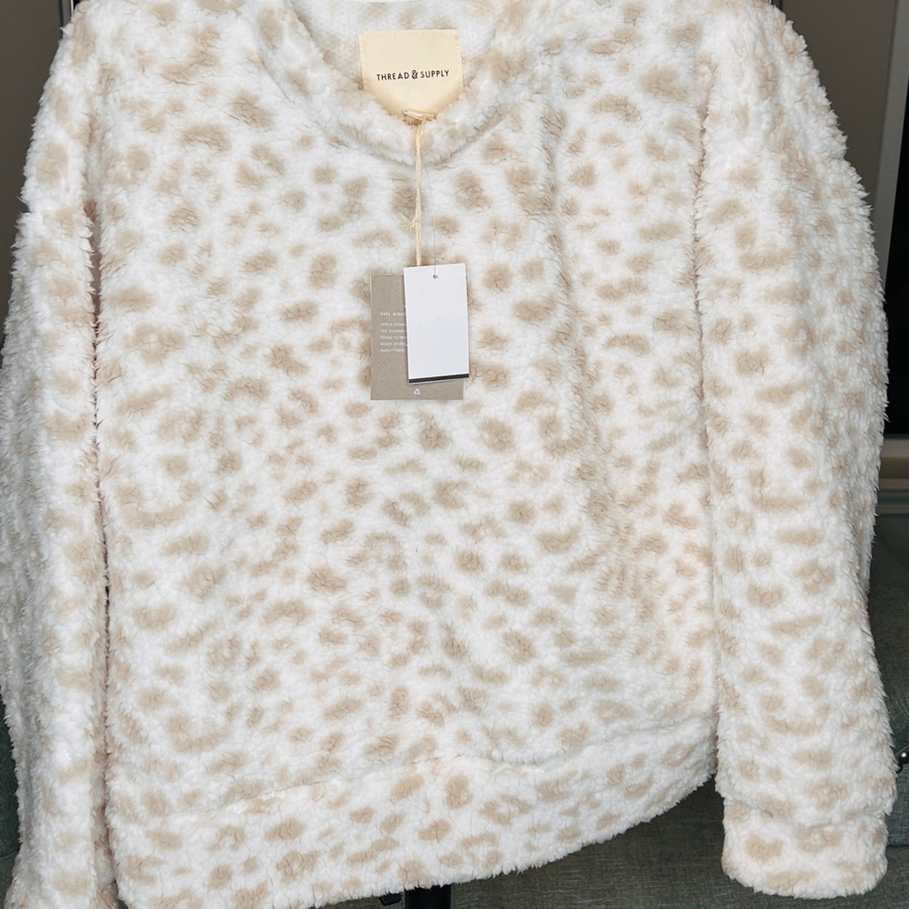 Sweater size small by tread & supply , color white leoprd
